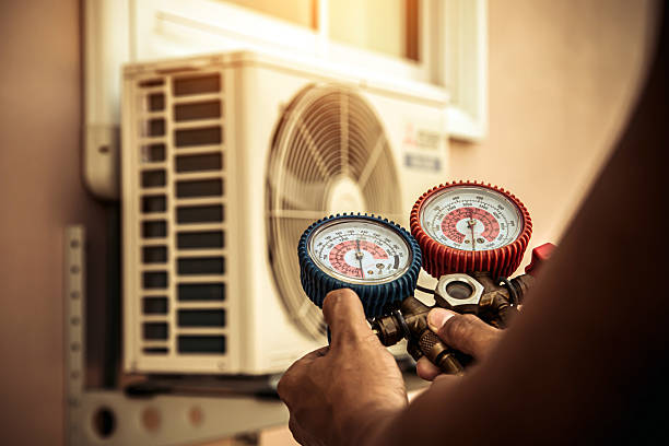 Professional Hvac technician working in Mc Donald, PA